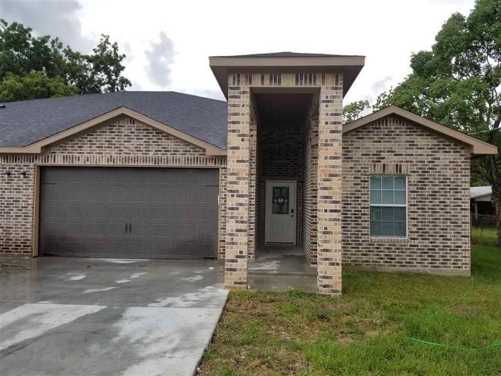Attached, Exterior, Facade, Brick Facade, Brick Traditional