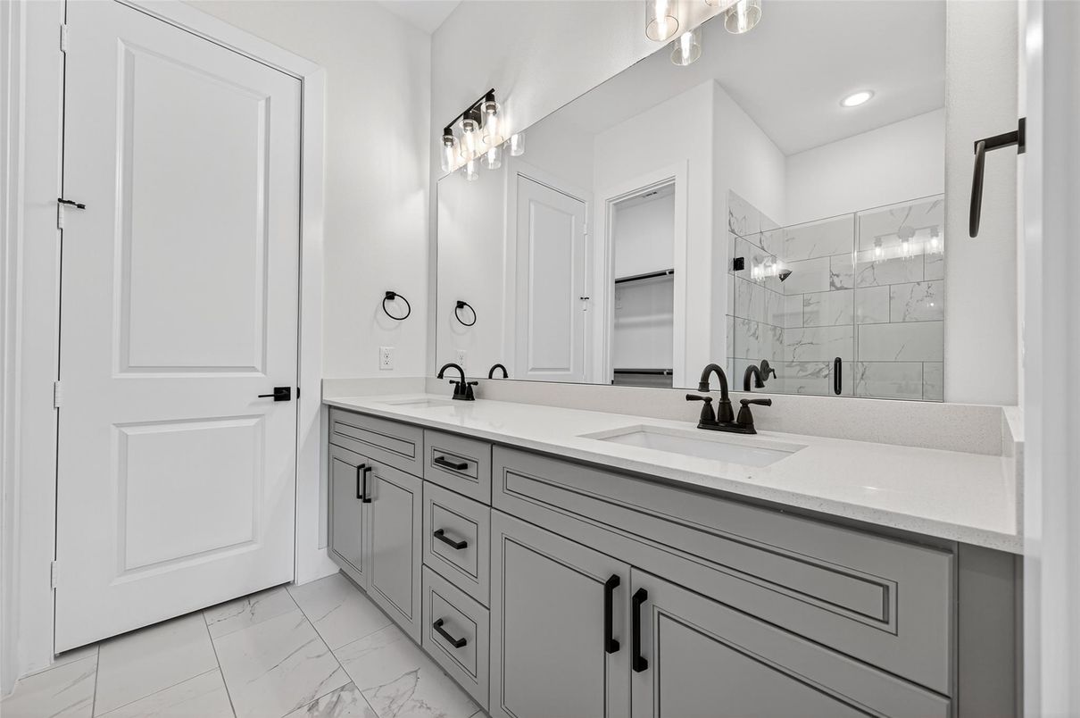 Bathroom, Dual Sink Vanities, Glass Shower, Interior, Marble, Marble Walls, Recessed Lighting