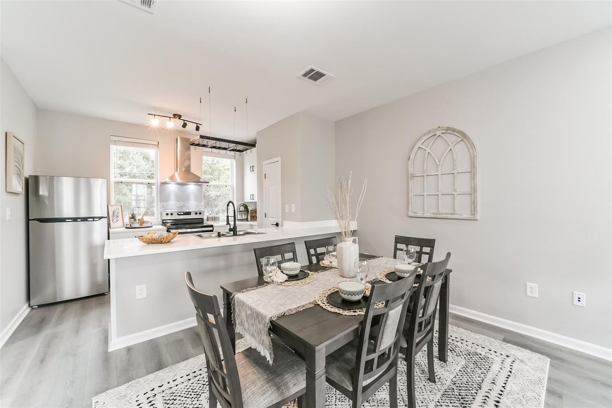 Dining room, Interior, Kitchen, Pendant Lights, Stainless Steel Appliances, Wood Texture Flooring