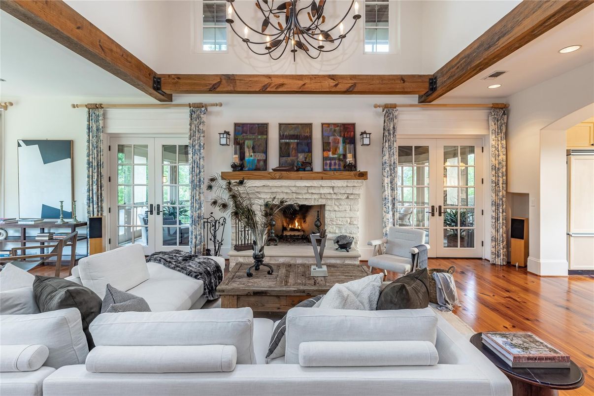 Chandelier, Dining room, Fireplace, Interior, Living room, Recessed Lighting, Wooden Beams, Wood Texture Flooring