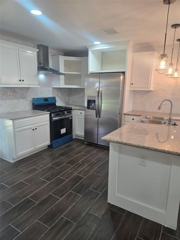 Interior, Kitchen, Marble Walls, Pendant Lights, Recessed Lighting, Stainless Steel Appliances, Wood Texture Flooring