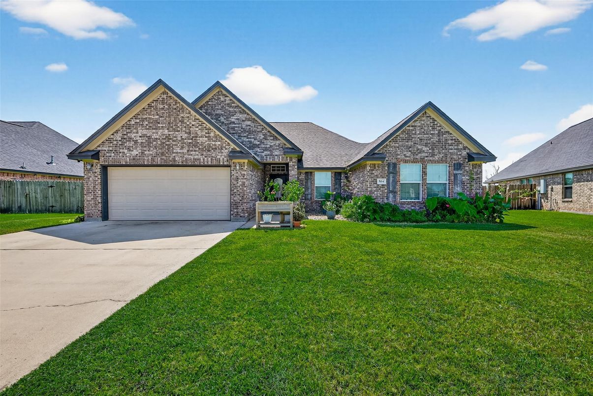 Attached, Backyard, Exterior, Facade, Brick Facade, Brick Traditional