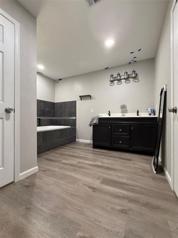 Bathroom, Dual Sink Vanities, Interior, Recessed Lighting, Wood Texture Flooring