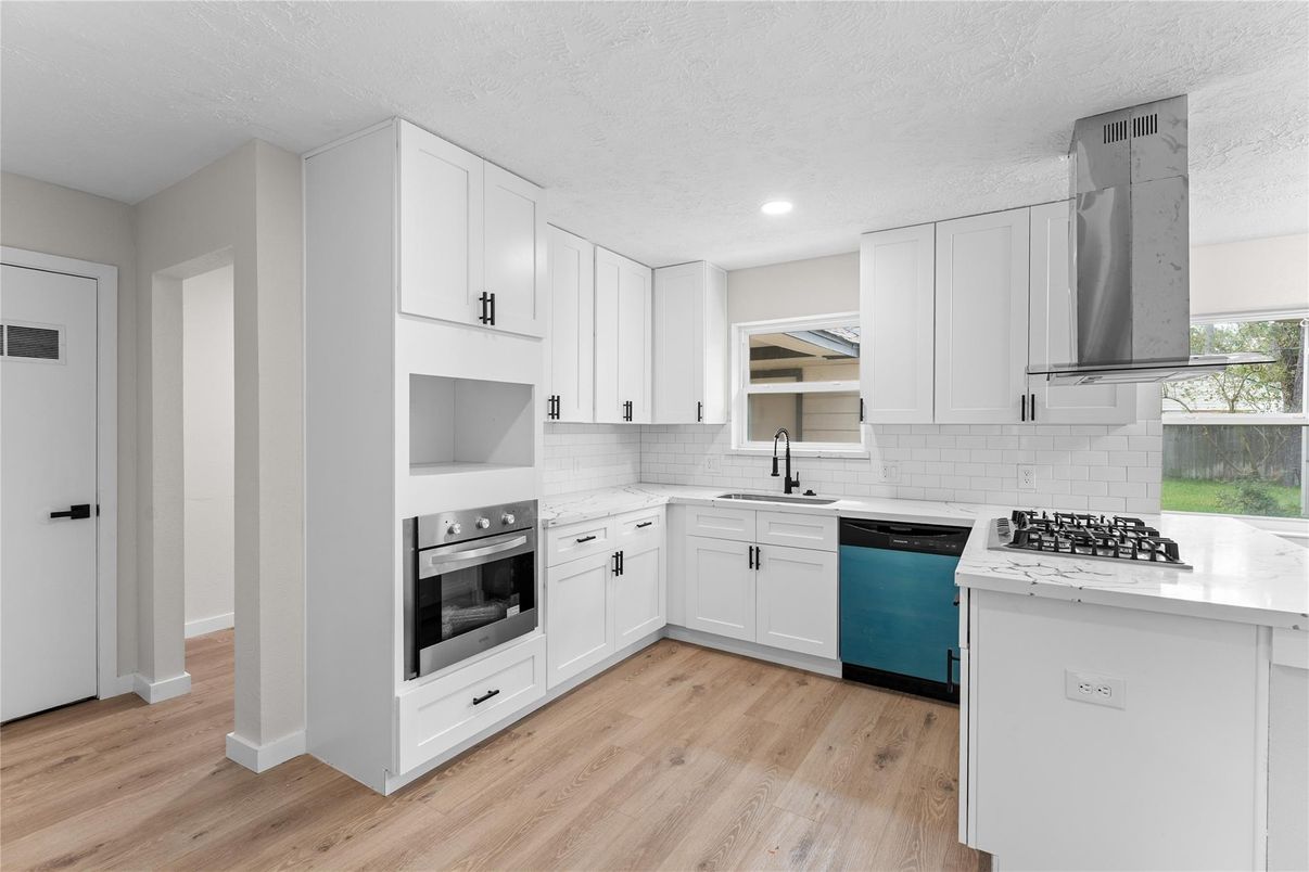 Interior, Kitchen, Recessed Lighting, Stainless Steel Appliances, Wood Texture Flooring