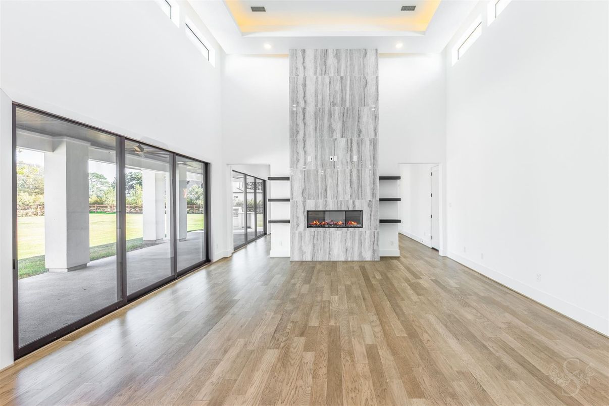 Empty room, Fireplace, Interior, Recessed Lighting, Wood Texture Flooring