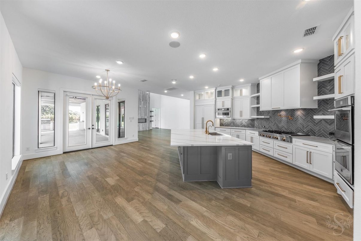 Chandelier, Interior, Kitchen, Recessed Lighting, Stainless Steel Appliances, Wood Texture Flooring