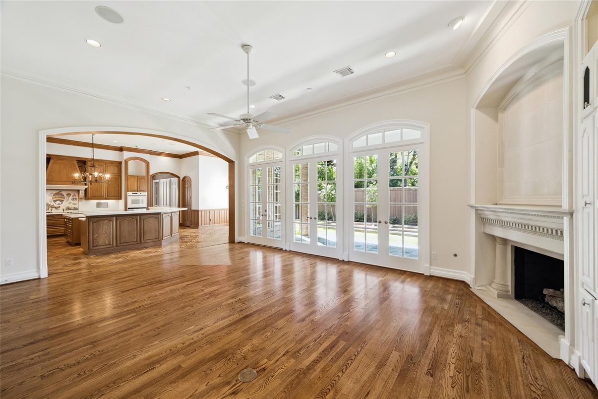Chandelier, Empty room, Fireplace, Interior, Kitchen, Recessed Lighting, Wood Texture Flooring
