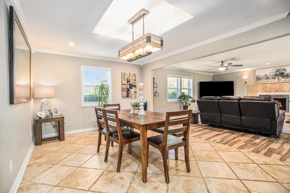 Dining room, Fireplace, Interior, Living room, Pendant Lights, Recessed Lighting, Wood Texture Flooring