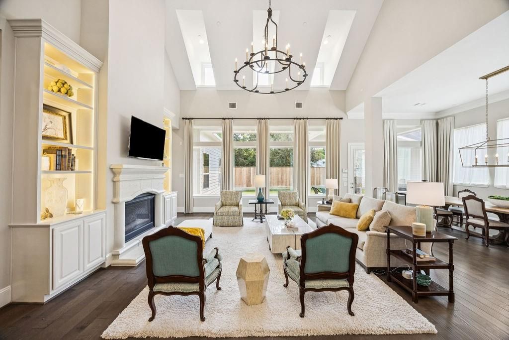 Chandelier, Dining room, Fireplace, Interior, Living room, Recessed Lighting, Wood Texture Flooring
