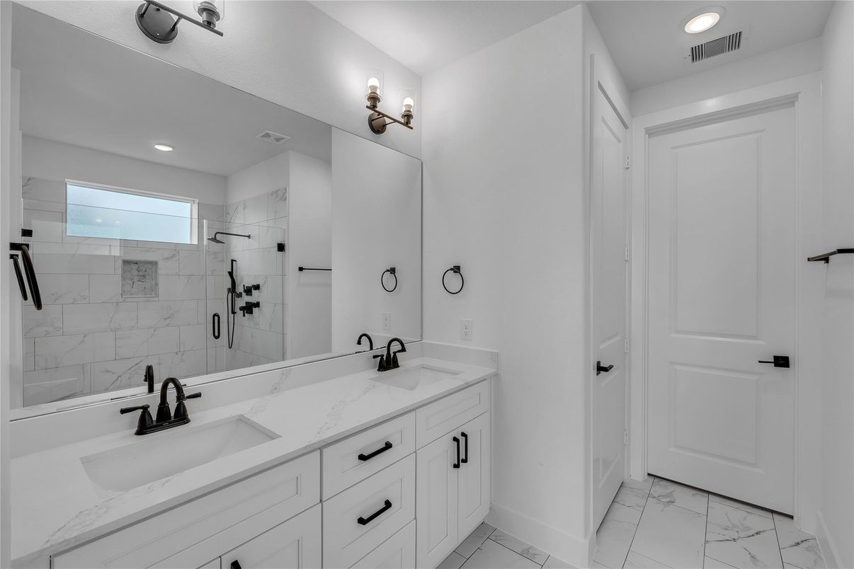 Bathroom, Dual Sink Vanities, Interior, Marble, Marble Walls, Recessed Lighting