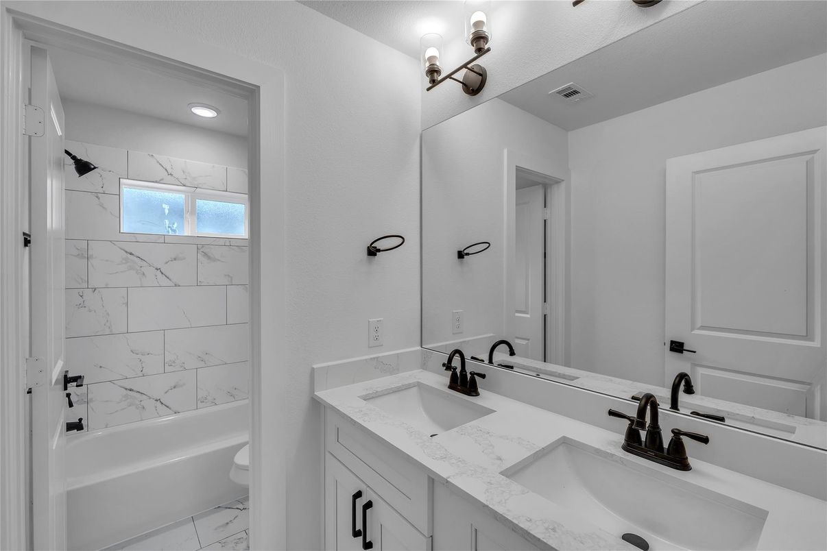 Bathroom, Dual Sink Vanities, Interior, Marble, Marble Walls, Recessed Lighting