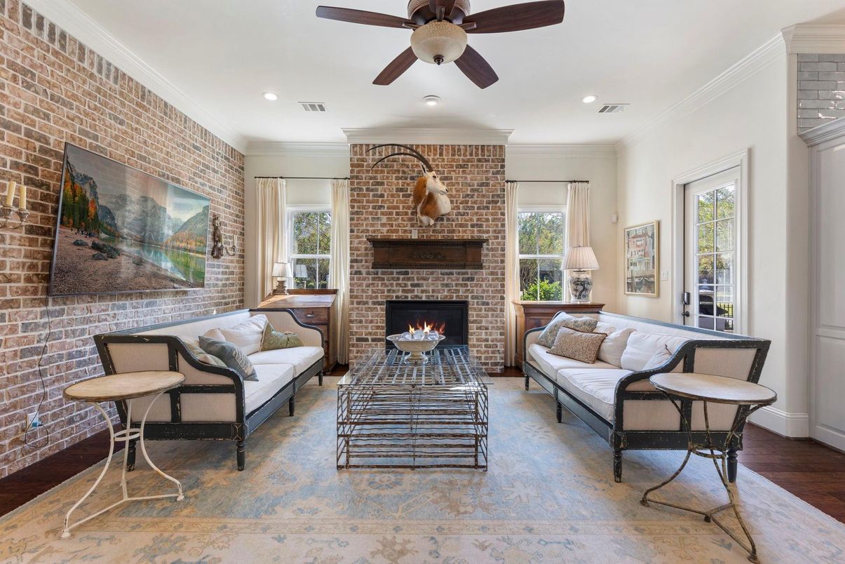 Fireplace, Interior, Living room, Recessed Lighting, Stone Walls, Wood Texture Flooring