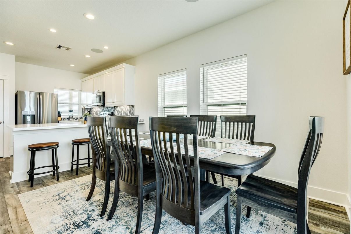 Dining room, Interior, Kitchen, Recessed Lighting, Stainless Steel Appliances, Wood Texture Flooring