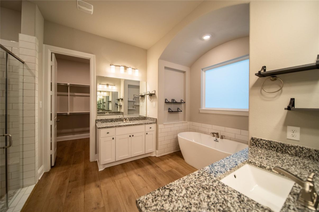 Bathroom, Dual Sink Vanities, Free Standing Baths, Interior, Recessed Lighting, Wood Texture Flooring