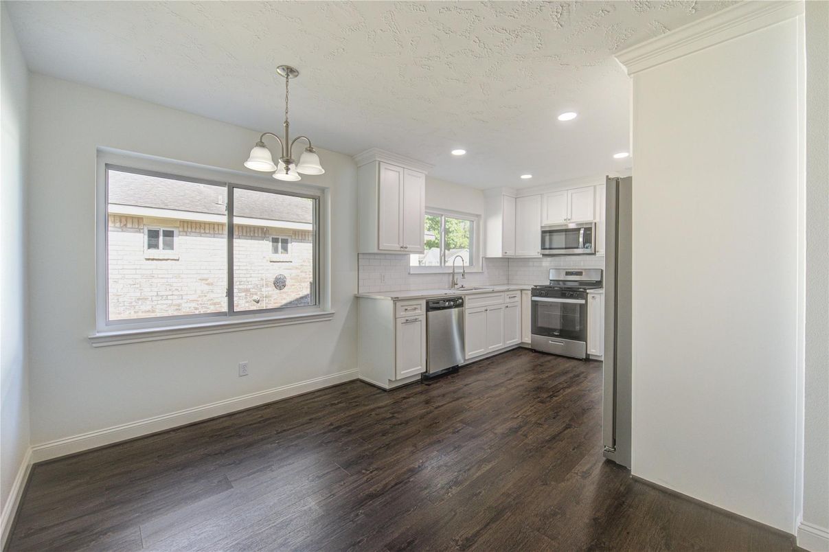 Interior, Kitchen, Pendant Lights, Recessed Lighting, Stainless Steel Appliances, Wood Texture Flooring