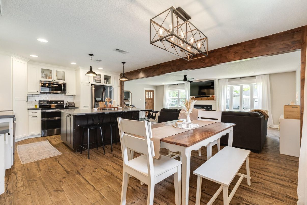 Dining room, Interior, Kitchen, Pendant Lights, Recessed Lighting, Stainless Steel Appliances, Wood Texture Flooring
