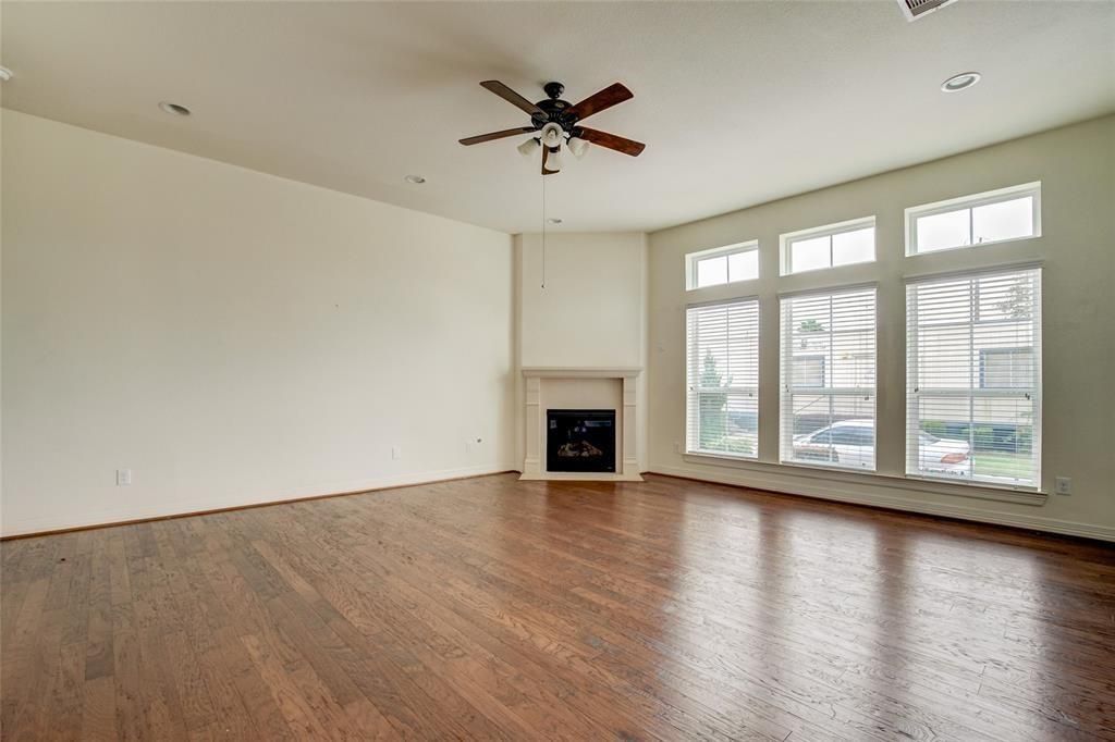 Empty room, Fireplace, Interior, Recessed Lighting, Wood Texture Flooring
