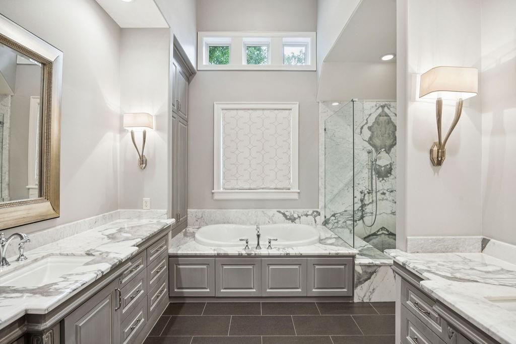 Bathroom, Dual Sink Vanities, Glass Shower, Interior, Marble Walls, Recessed Lighting