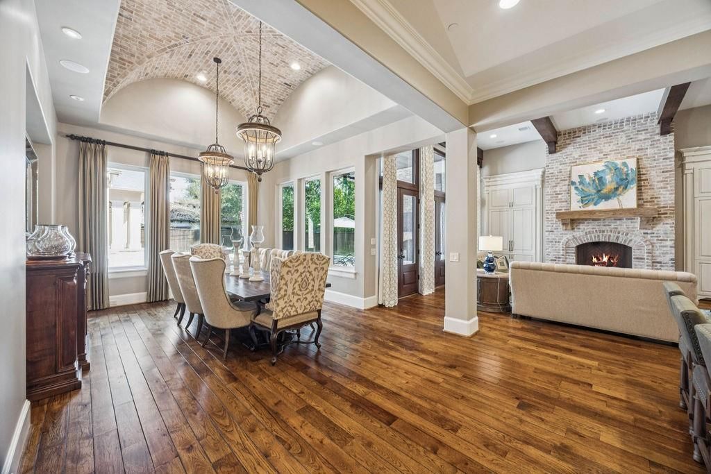 Dining room, Fireplace, Interior, Living room, Pendant Lights, Recessed Lighting, Stone Walls, Wooden Beams, Wood Texture Flooring