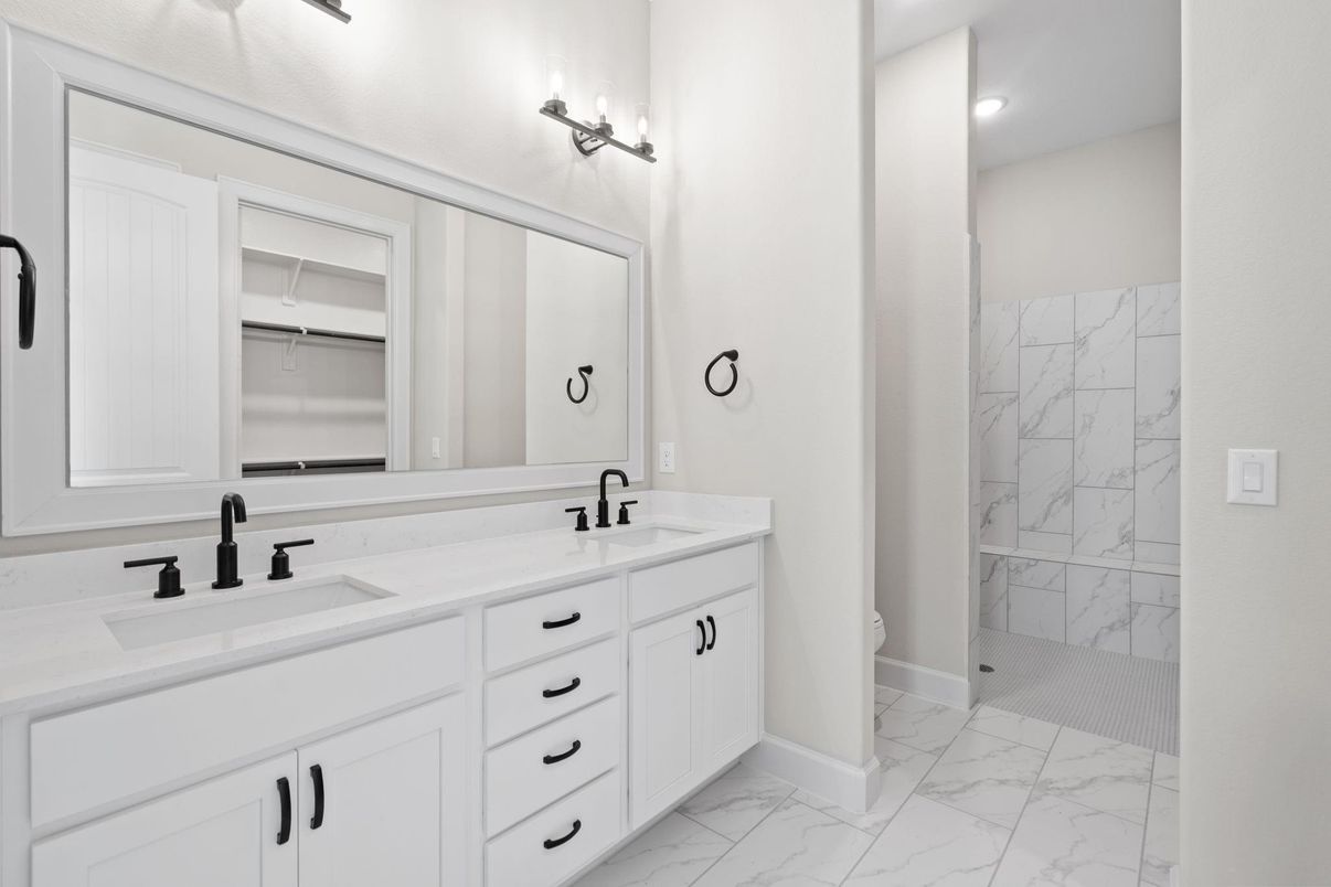 Bathroom, Dual Sink Vanities, Interior, Marble, Marble Walls, Recessed Lighting