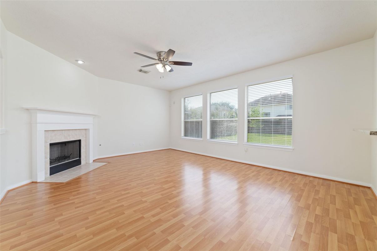 Empty room, Fireplace, Interior, Recessed Lighting, Wood Texture Flooring