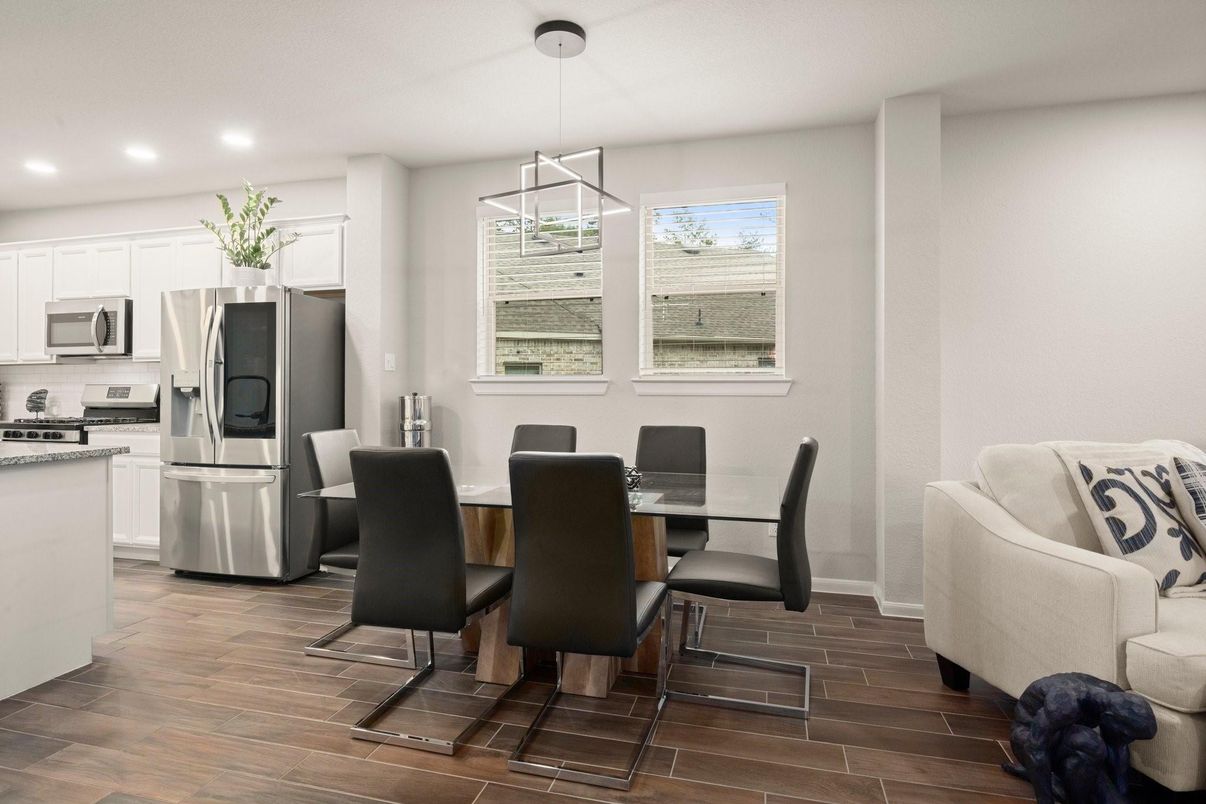 Dining room, Interior, Kitchen, Recessed Lighting, Stainless Steel Appliances, Wood Texture Flooring