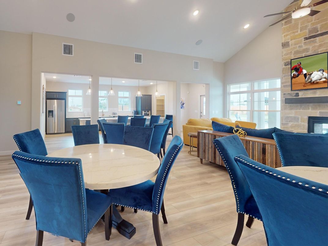 Dining room, Fireplace, Interior, Kitchen, Living room, Pendant Lights, Recessed Lighting, Stainless Steel Appliances, Stone Walls, Wood Texture Flooring