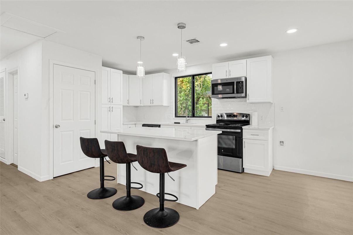 Interior, Kitchen, Pendant Lights, Recessed Lighting, Stainless Steel Appliances, Wood Texture Flooring