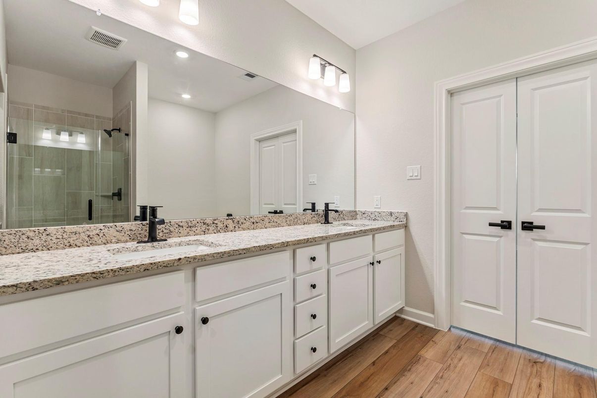 Bathroom, Dual Sink Vanities, Glass Shower, Interior, Recessed Lighting, Wood Texture Flooring