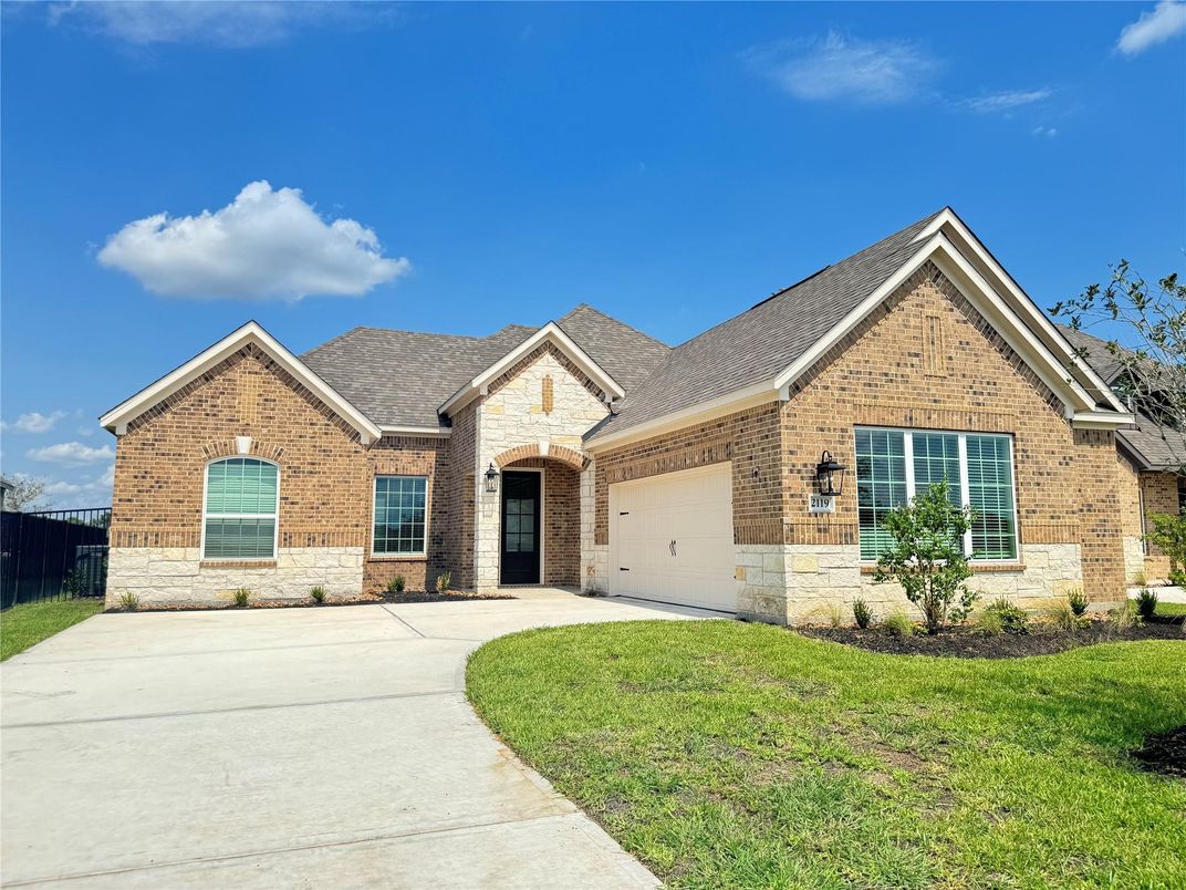 Attached, Exterior, Facade, Brick Facade, Brick Traditional