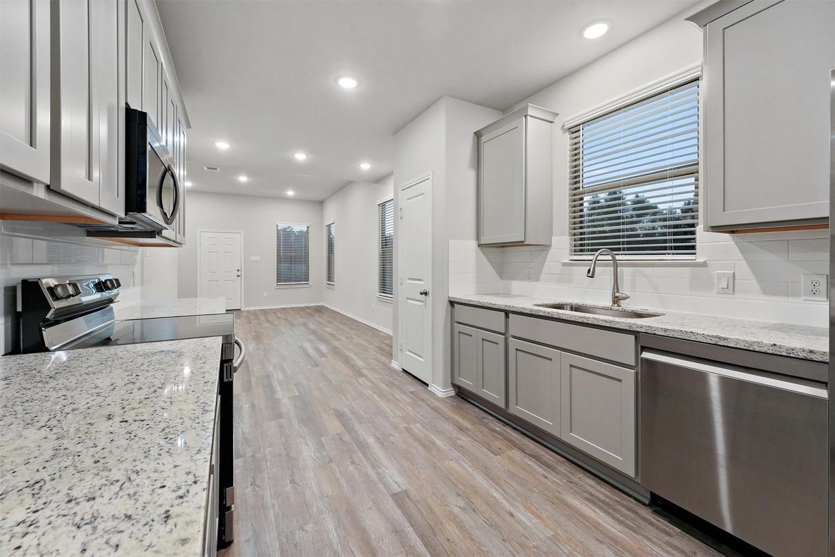 Interior, Kitchen, Recessed Lighting, Stainless Steel Appliances, Wood Texture Flooring