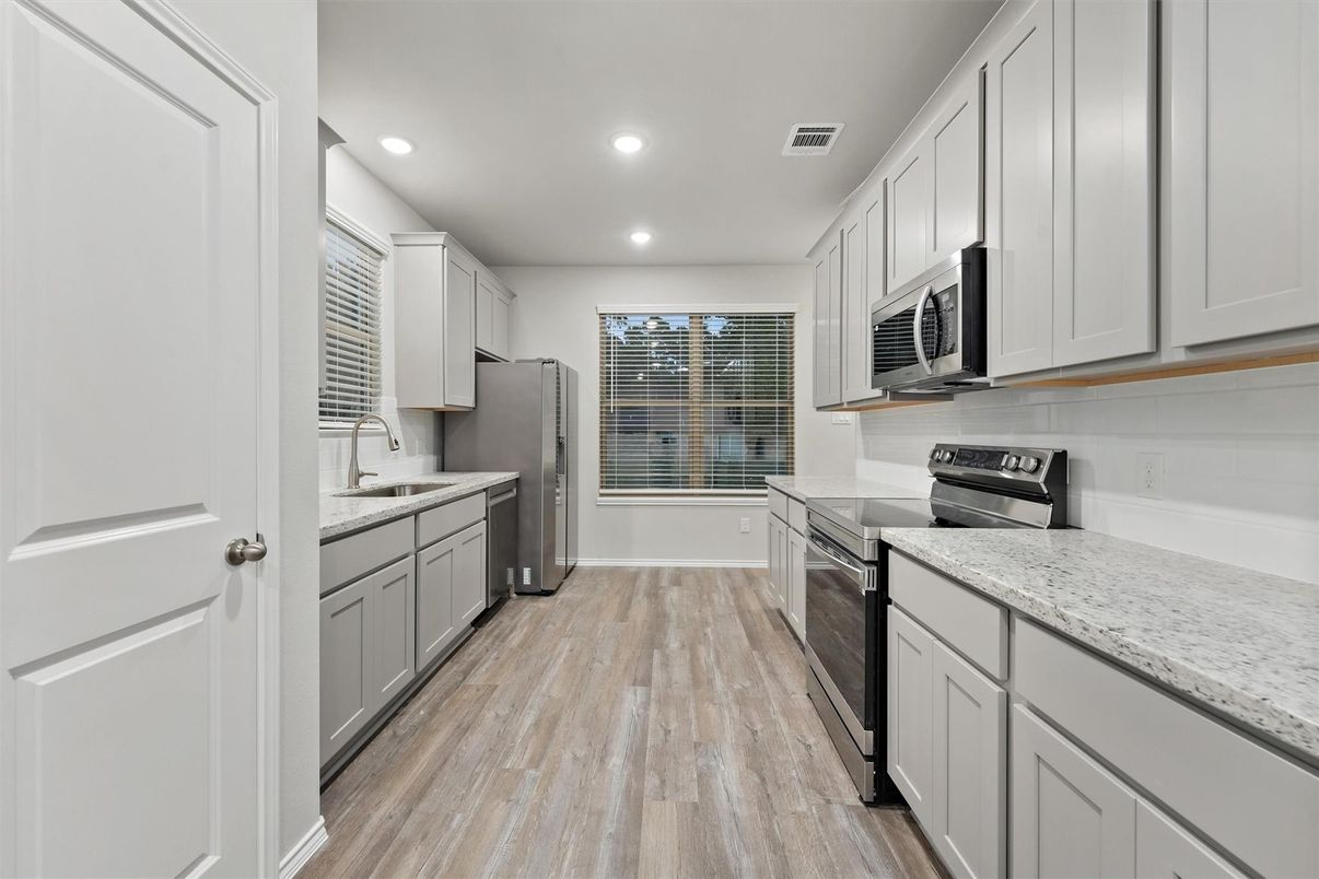 Interior, Kitchen, Recessed Lighting, Stainless Steel Appliances, Wood Texture Flooring