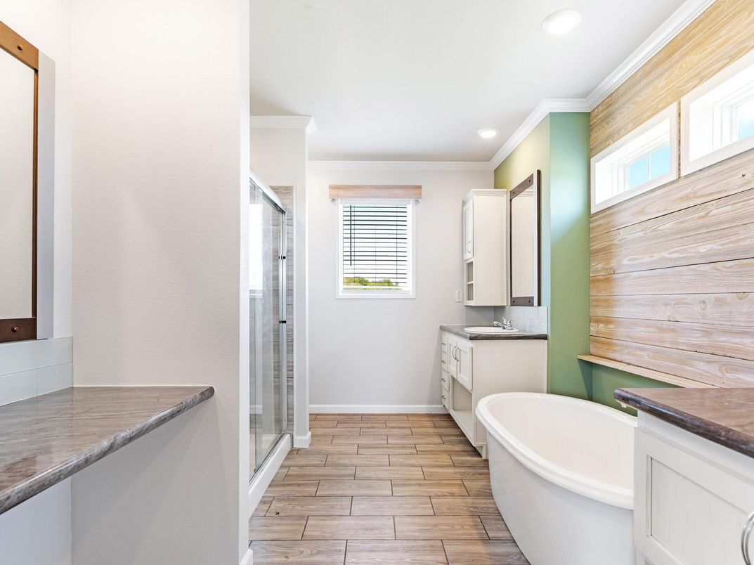 Bathroom, Dual Sink Vanities, Free Standing Baths, Glass Shower, Interior, Recessed Lighting, Wood Texture Flooring