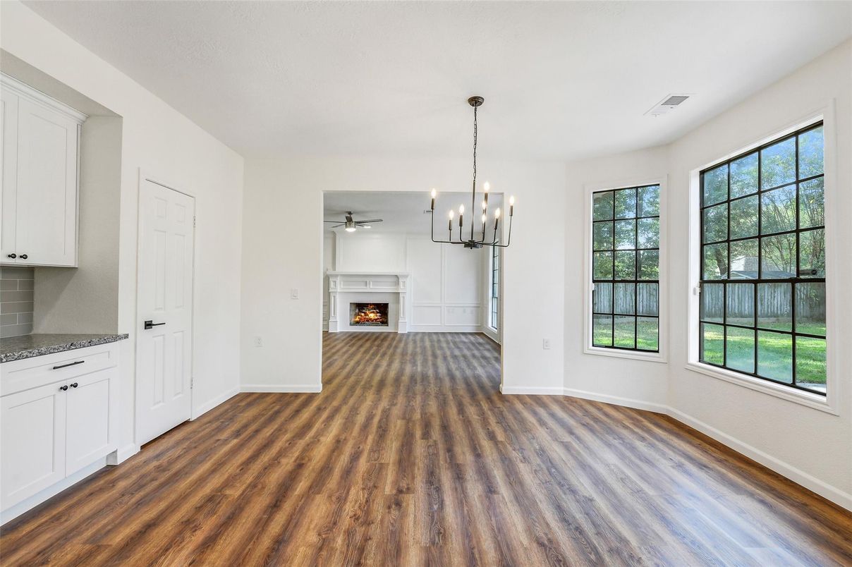 Empty room, Fireplace, Interior, Pendant Lights, Wood Texture Flooring