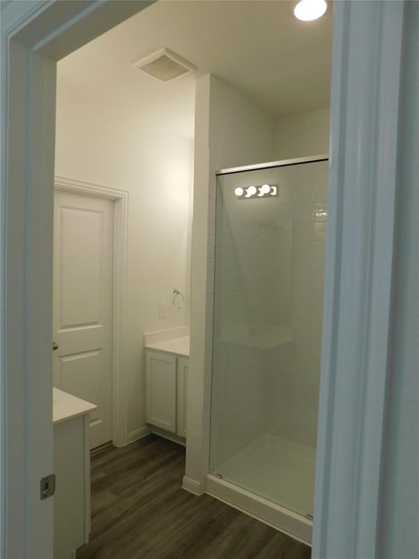 Bathroom, Glass Shower, Interior, Recessed Lighting, Wood Texture Flooring