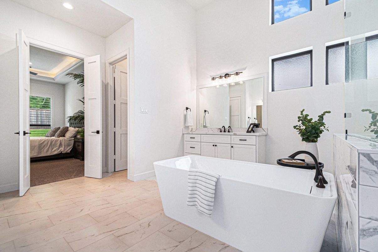 Bathroom, Bedroom, Dual Sink Vanities, Free Standing Baths, Interior, Marble, Recessed Lighting, Wood Texture Flooring