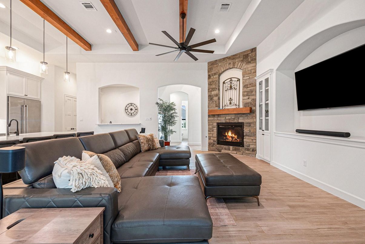 Fireplace, Interior, Living room, Pendant Lights, Recessed Lighting, Stone Walls, Wooden Beams, Wood Texture Flooring