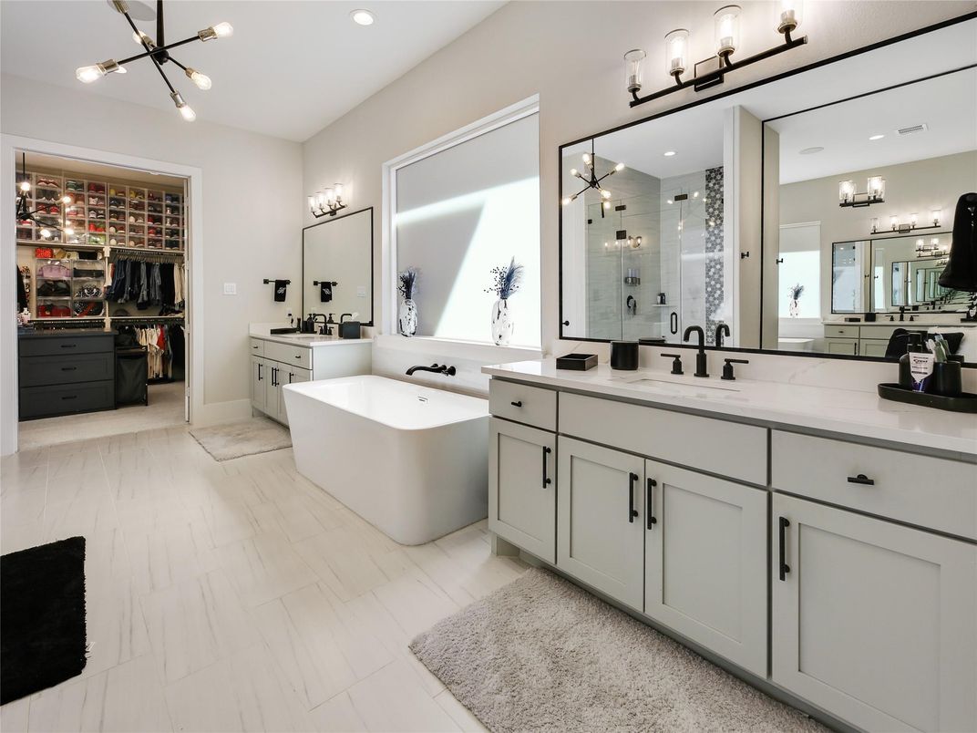 Bathroom, Dual Sink Vanities, Free Standing Baths, Interior, Marble, Pendant Lights, Recessed Lighting