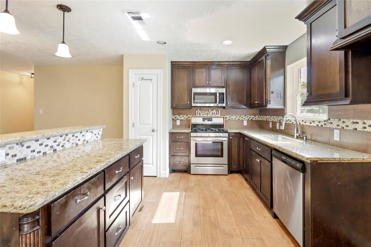 Interior, Kitchen, Pendant Lights, Recessed Lighting, Stainless Steel Appliances, Wood Texture Flooring