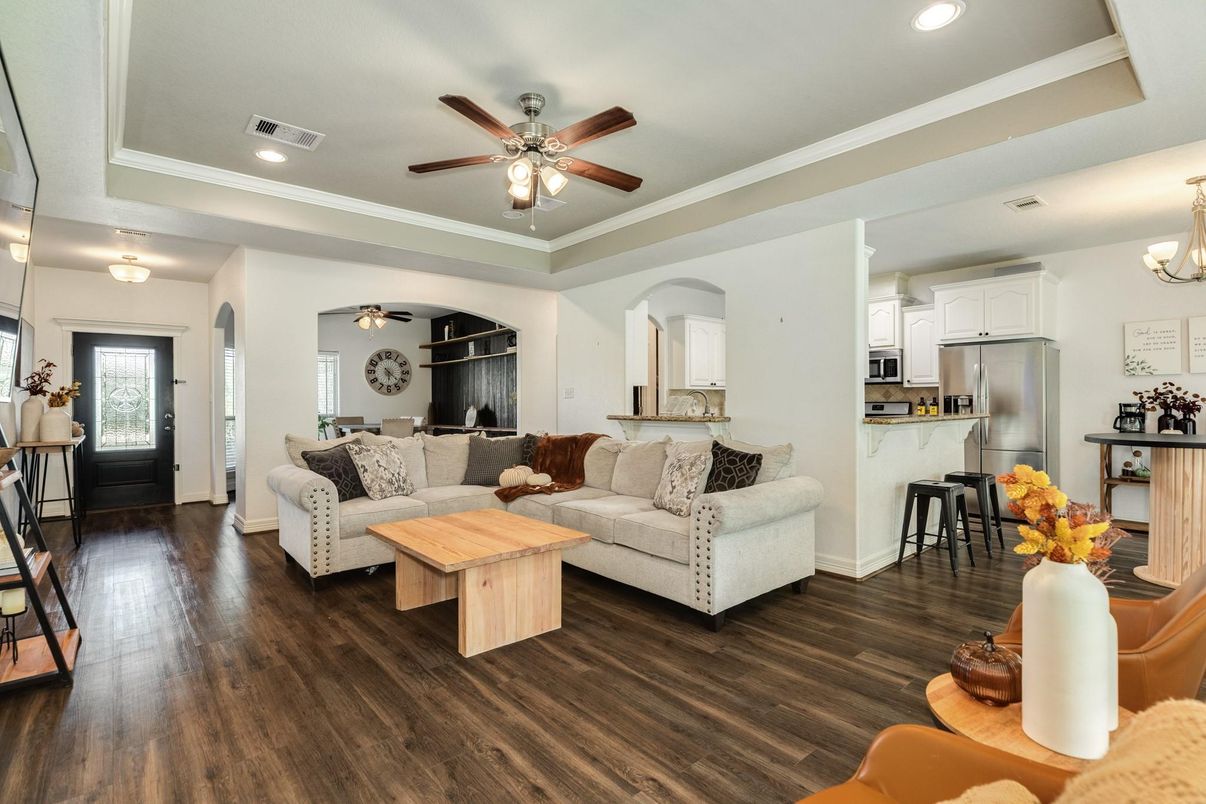 Chandelier, Dining room, Interior, Kitchen, Living room, Pendant Lights, Recessed Lighting, Stainless Steel Appliances, Wood Texture Flooring