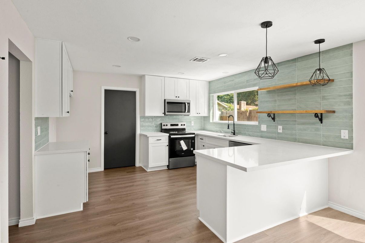 Interior, Kitchen, Pendant Lights, Recessed Lighting, Stainless Steel Appliances, Wood Texture Flooring