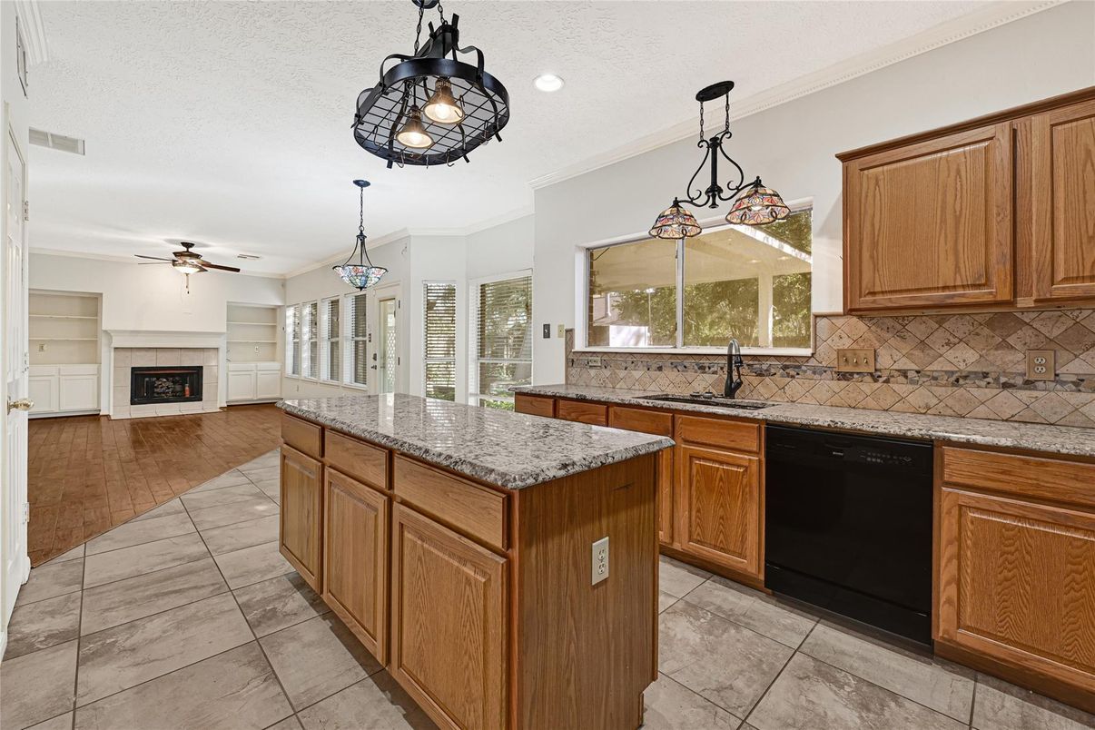 Chandelier, Fireplace, Interior, Kitchen, Pendant Lights, Recessed Lighting, Wood Texture Flooring