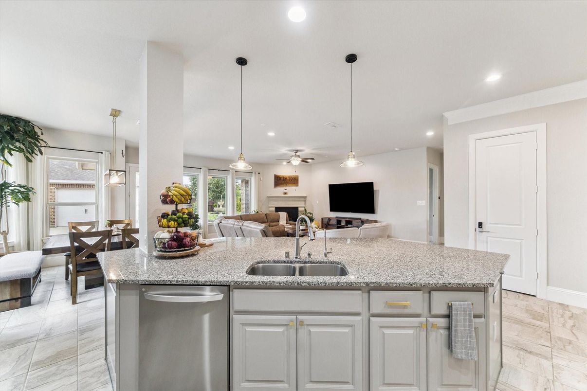 Dining room, Fireplace, Interior, Kitchen, Living room, Marble, Pendant Lights, Recessed Lighting, Stainless Steel Appliances