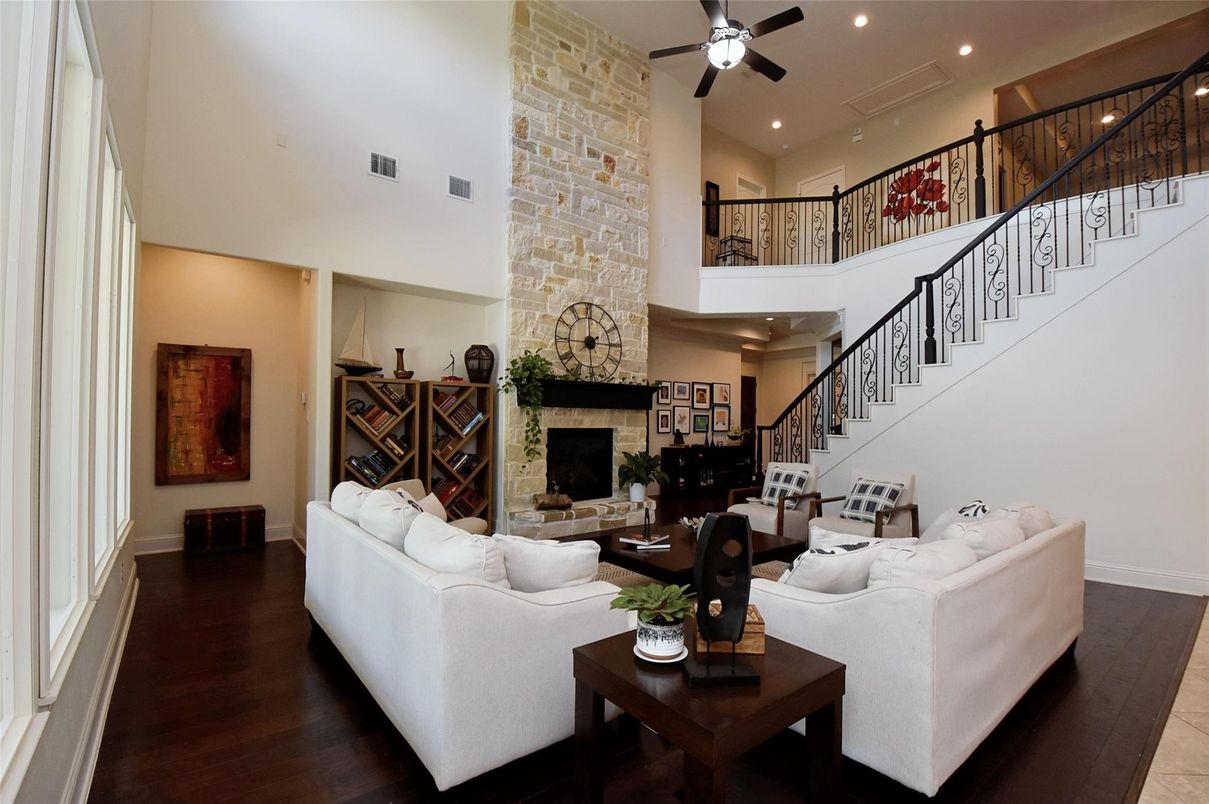 Fireplace, Interior, Living room, Recessed Lighting, Stone Walls, Wood Texture Flooring