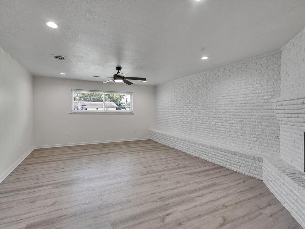 Empty room, Interior, Recessed Lighting, Stone Walls, Wood Texture Flooring