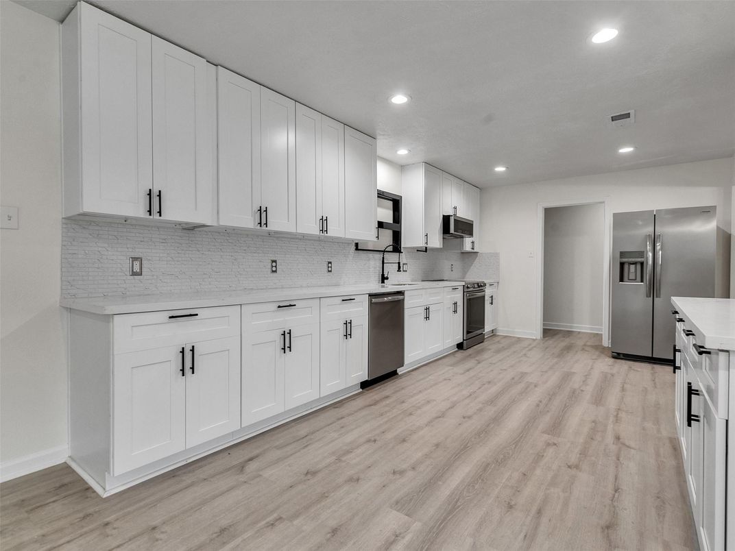 Interior, Kitchen, Recessed Lighting, Stainless Steel Appliances, Wood Texture Flooring