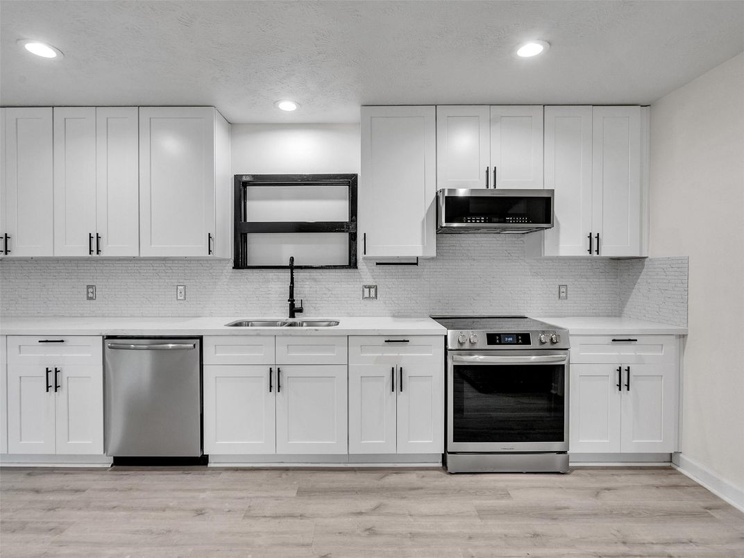 Interior, Kitchen, Recessed Lighting, Stainless Steel Appliances, Wood Texture Flooring