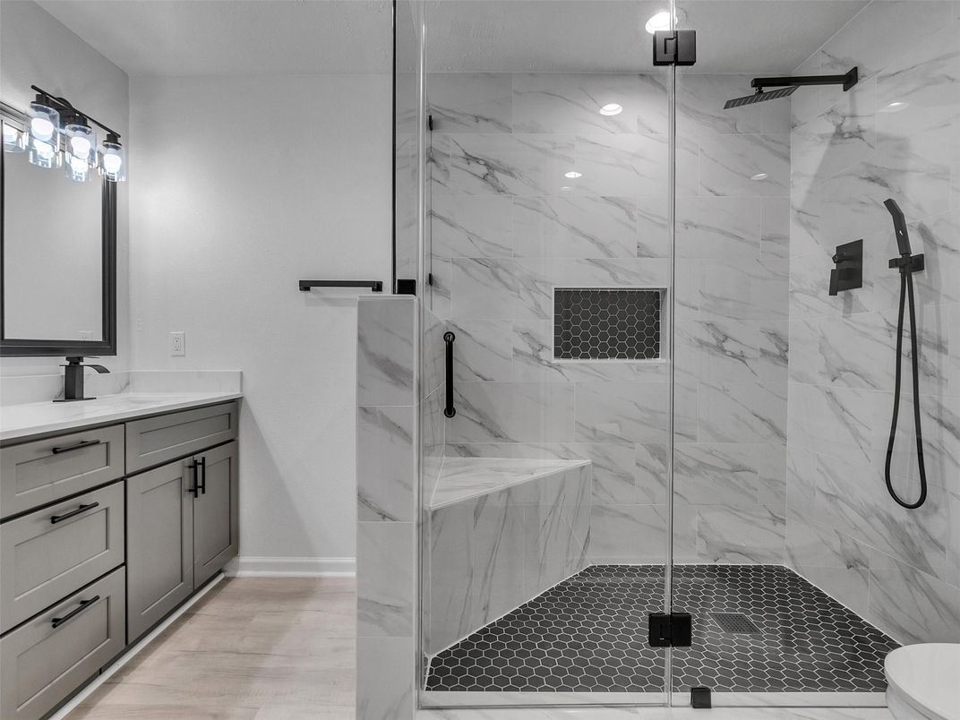 Bathroom, Glass Shower, Interior, Marble Walls, Wood Texture Flooring