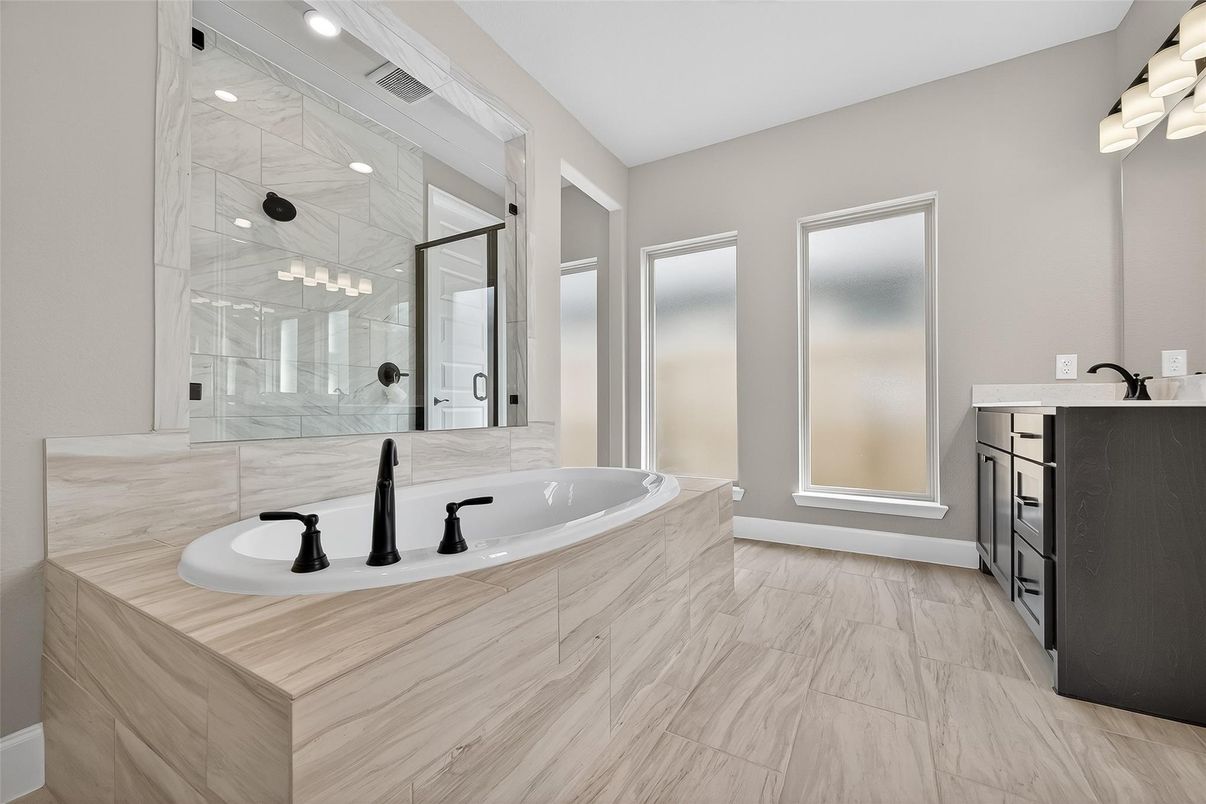 Bathroom, Dual Sink Vanities, Glass Shower, Interior, Marble, Marble Walls, Recessed Lighting