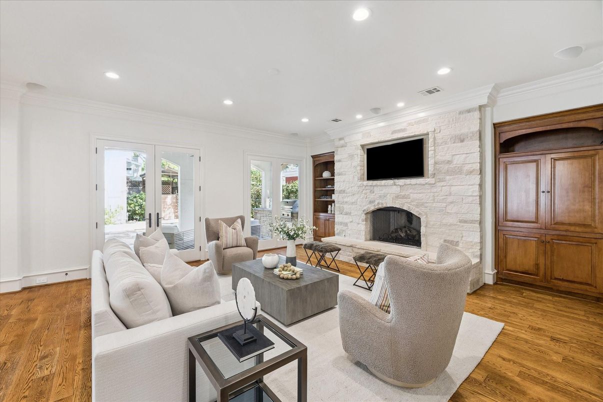 Fireplace, Interior, Living room, Recessed Lighting, Stone Walls, Wood Texture Flooring